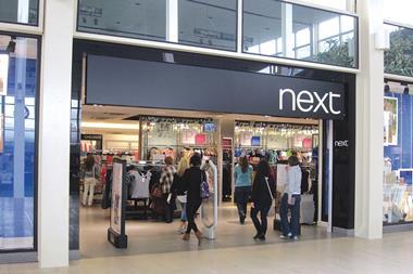Next has improved its forecast for profits in the second half buoyed by strong growth in its directory business in the first half