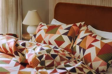 Patterned George at Asda pillows on bed