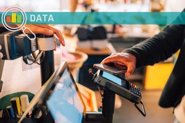 Man tapping phone on card reader1.jpg