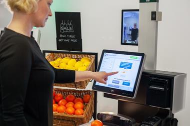 Customer paying at a till using SeeChange technology
