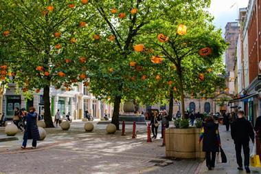 St Annes Square Manchester with pumpkin decorations in trees
