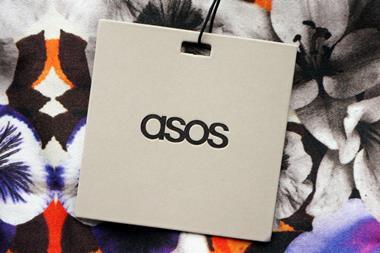 Asos label lying on top of a floral patterned garment