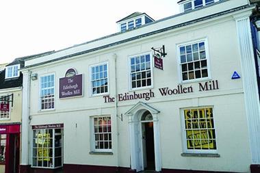 Edinburgh Woollen Mill has unveiled a rise in group profits as it plots 100 store openings in the next two years.