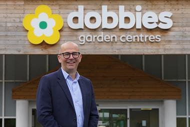 Dobbies CEO David Robinson outside a garden centre