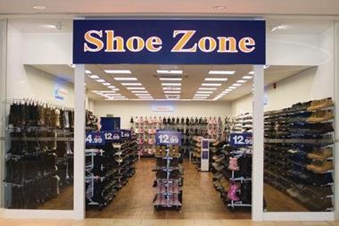 Shoe Zone's profits edged up last year