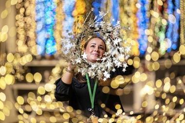Colleague working in John Lewis Christmas Shop