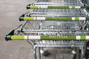 Shopping trolleys with Waitrose logo on