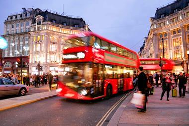 Shoppers and a red bus on Oxford Street