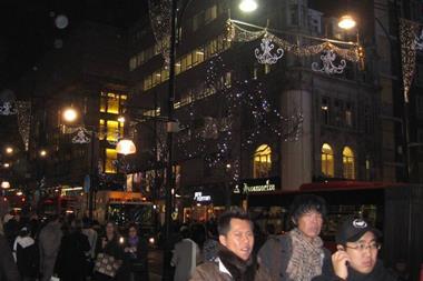 Shoppers at Christmas in London