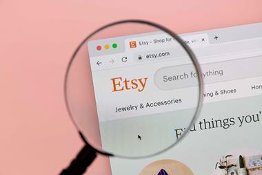 Etsy website under magnifying glass