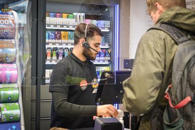 Man working at store checkout