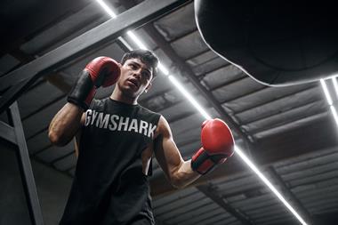 Model wearing Gymshark clothing and boxing