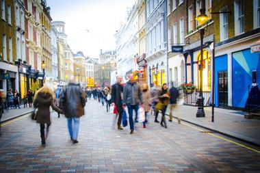 People walking on a busy high street