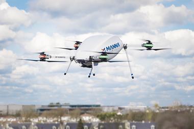 Manna-branded drone flying high above houses in Ireland