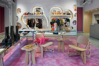 Interior of Heaven by Marc Jacobs, London, store showing clothing and seating
