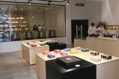 The upmarket chocolate shop has come to London with a scientific store design that gives sweet shopping a grown-up setting.