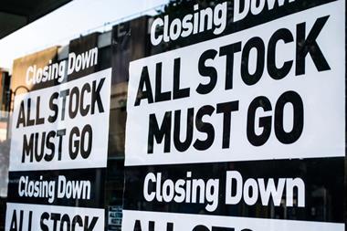 Closing down sale sign in shop window
