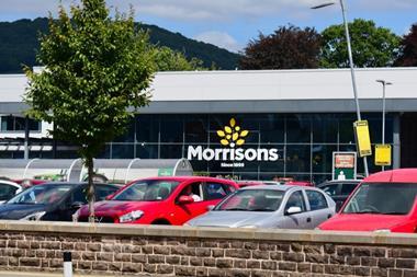 Exterior of Morrisons Abergavenny, showing store and car park