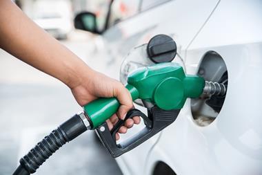 Petrol pump nozzle in car