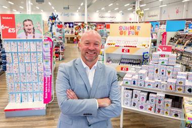 Hobbycraft boss Graeme Campbell in front of in-store display