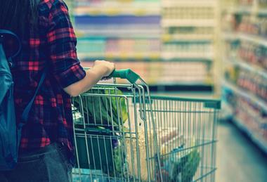 Consumer with shopping trolley