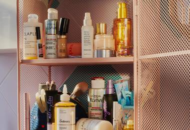 Selection of beauty brands stocked by Asos on a bathroom shelf