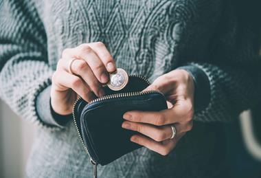 Woman checking wallet