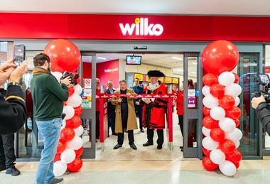 Owner Chris Dawson cutting the ribbon Wilko's Plymouth store