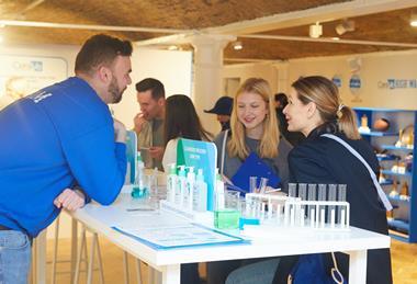 Employees and customers at CeraVe pop-up, Covent Garden