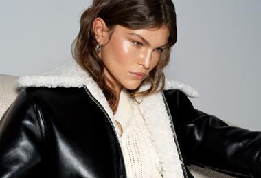 Female model wearing French Connection leather jacket