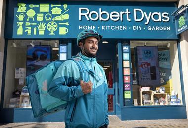 Deliveroo rider outside Robert Dyas store