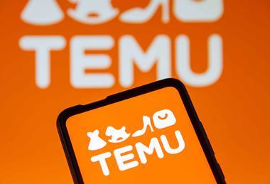 Temu logo on phone screen with Temu logo in background
