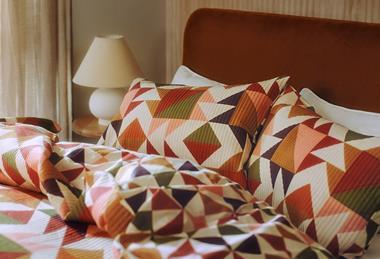 Patterned George at Asda pillows on bed