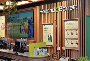 The use of natural materials like timber along with planting can create a more calming environment for shoppers - Holland and Barrett chelmsford