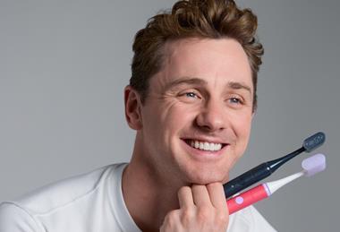 Barty Walsh Headshot - With Product - 1