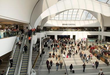 Consumers in a busy shopping centre