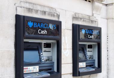 Two ATMs with Barclays logo above