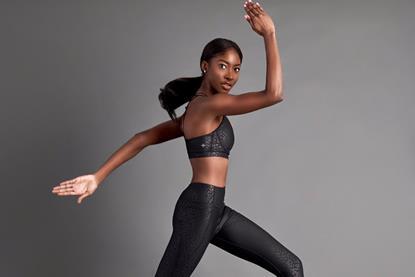 Model running wearing Skims sportswear