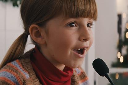 Still from Sainsbury's ad showing little girl on supermarket tannoy