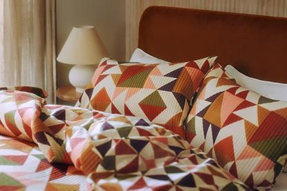 Patterned George at Asda pillows on bed