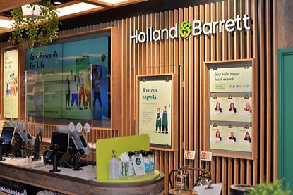 The use of natural materials like timber along with planting can create a more calming environment for shoppers - Holland and Barrett chelmsford