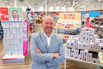 Hobbycraft boss Graeme Campbell in front of in-store display