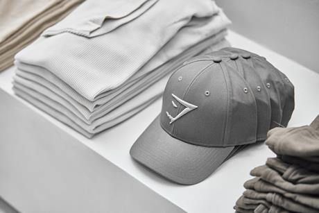Gymshark branded baseball caps on display in its Dubai store