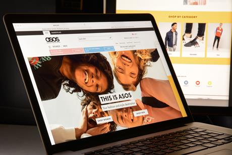 ASOS website homepage on laptop
