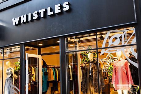 Whistle store sign