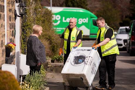 AO drivers delivering a washing machine
