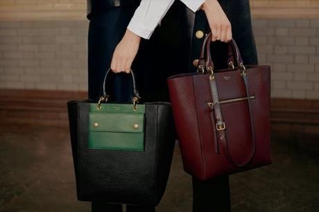 Two models shown from waist down holding green and red Mulberry bags