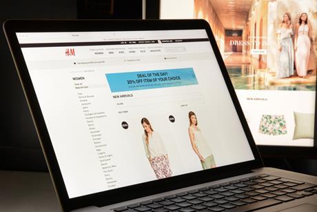 H&M website on laptop screen