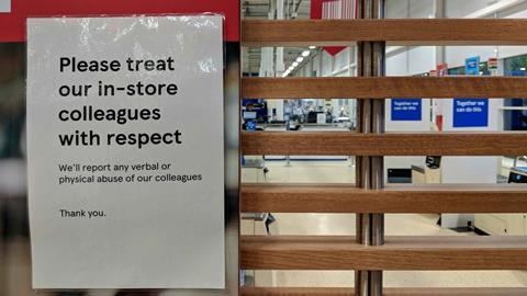 Sign in a supermarket that says: 'Please treat our store colleagues with respect'