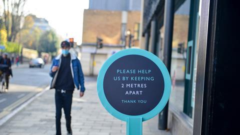 John Lewis social distancing sign